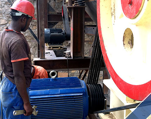 African friend operating a jaw crusher